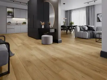 Drewnopodobne panele laminowane czy winylowe tworzą ciepłą bazę dla nowoczesnego wnętrza z kuchnią, salonem i toaletką.